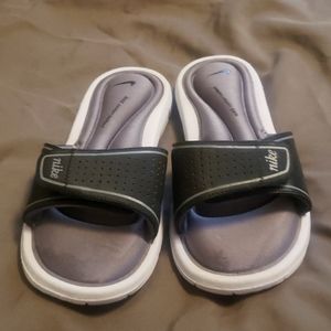 Boys slide on Nike sandels